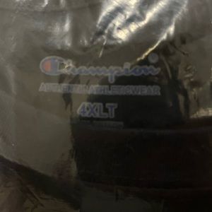 NWT in plastic, long sleeve shirt